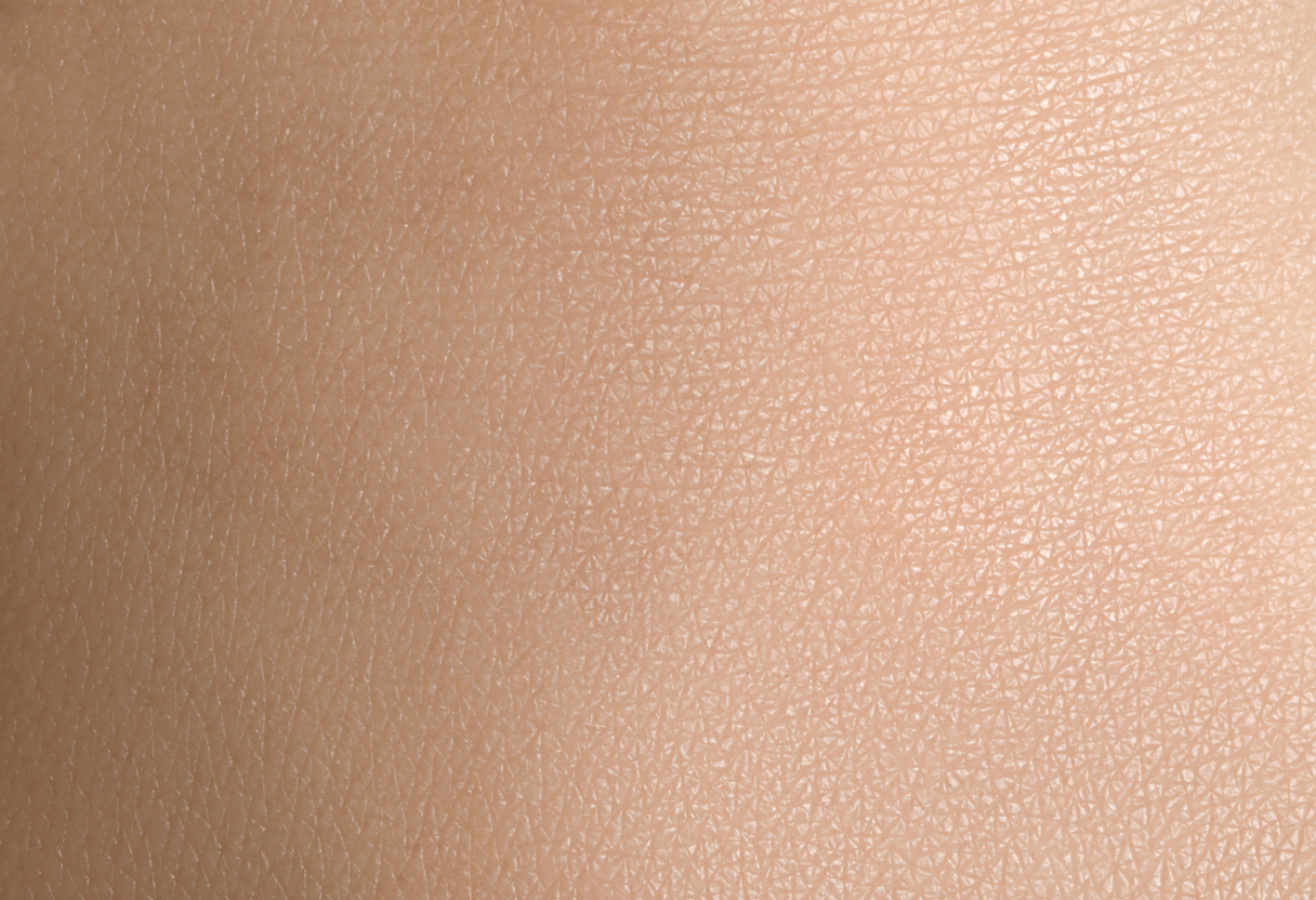 A close-up of normal skin texture, showing even pores and smooth appearance.